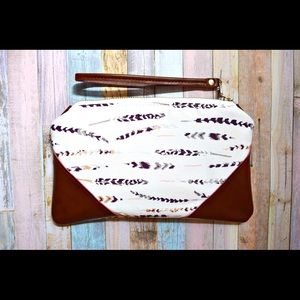 Feather genuine leather wristlet